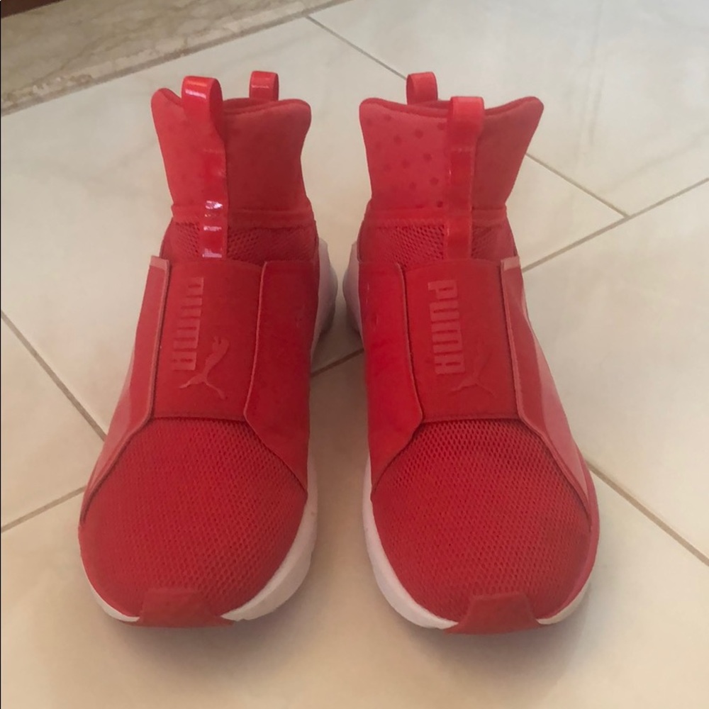 Red puma sneakers